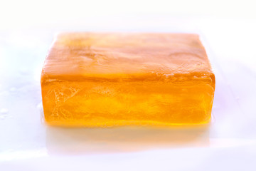 Orange Bar of Glycerin Soap Isolated on White