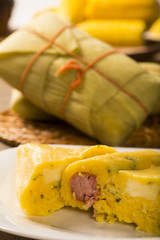 Salty Pamonha with sausage and cheese - typical food of green co