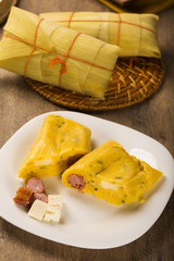 Salty Pamonha with sausage and cheese - typical food of green co