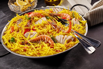 Single serve pan of pasta noodles and seafood