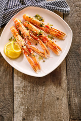 Langoustine Shellfish on Platter with Lemon Slices
