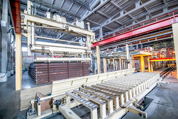 Naklejka premium industrial equipment at the factory in a large production hall
