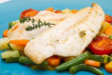 fresh cod on bed of mixed vegetables
