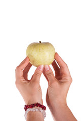 Summer green apple in hand isolated on white background