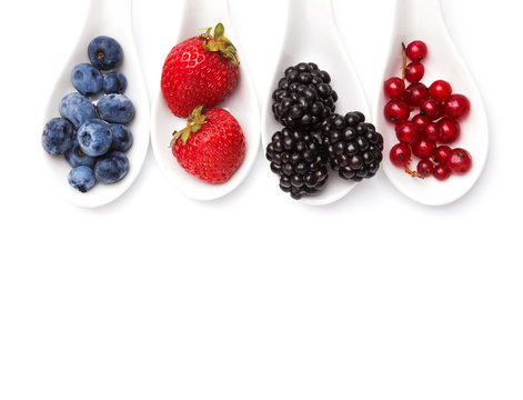 Summer berries on spoons