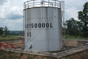 Obraz premium Large white tanks for diesel fuel