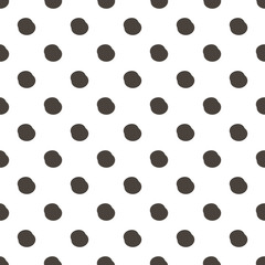 Black and white polka dots seamless pattern background.   © cosmic_pony