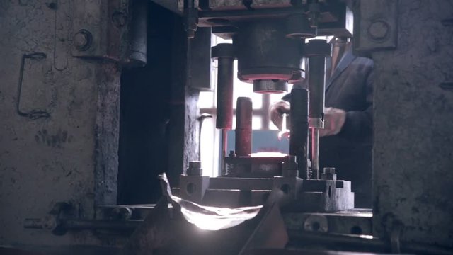 Forging steel machine inside industrial plant. HD.