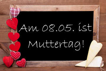 Fototapeta na wymiar One Chalkbord, Red And Yellow Hearts, Muttertag Mean Mothers Day