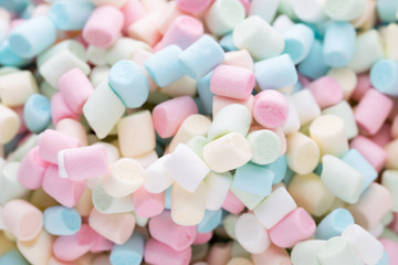 Background or texture of colorful mini marshmallows.