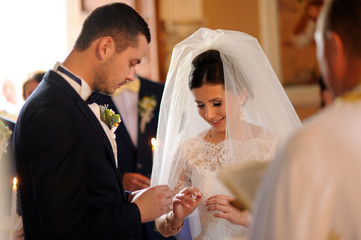 bride and groom in the church