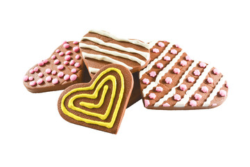 Close up image of hearts, chocolate cookies and candies, isolated on white.