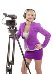 beautiful young woman with a professional video camera and headp