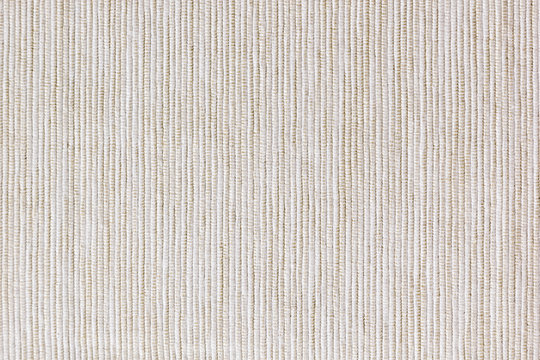 Fototapeta The beige texture cloth. The ribbed canvas. The background.