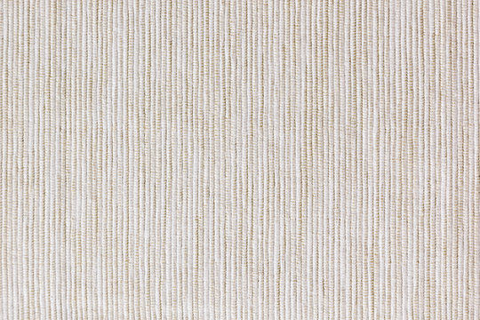 Fototapeta The beige texture cloth. The ribbed canvas. The background.
