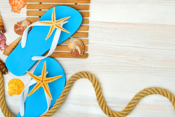 Flip-flops, starfish and seashells.