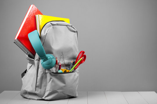 Full School Backpack On Grey Background