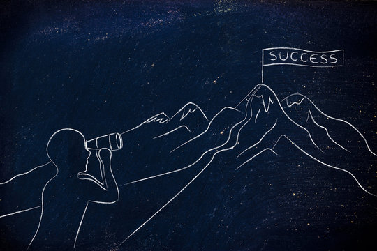 man with binoculars looking at Success banner on a mountain top