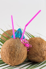 Fresh coconut cocktails with umbrellas