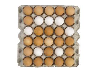 tray full of white and brown eggs