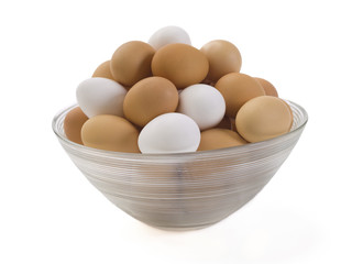 white and brown egg in a bowl