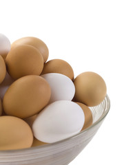 close up image of white and brown eggs