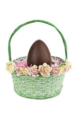 flowers and easter egg in basket.
