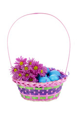 pink basket with flowers and easter eggs