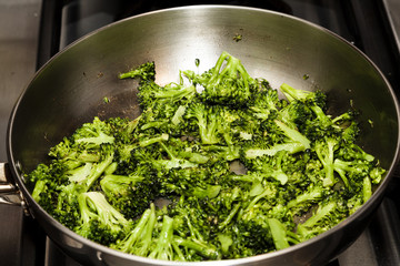 Sauteed Broccoli In Stainless Steel Frying Pan