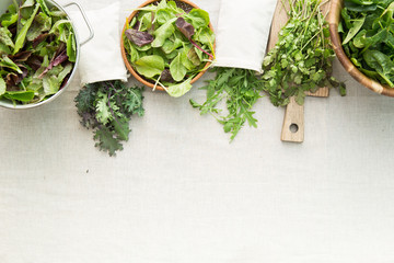 leafy greens on a linen tablecloth