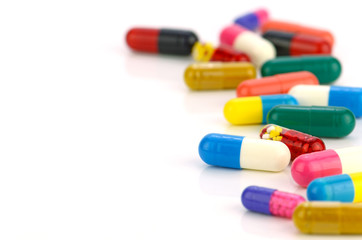 Colorful of oral medications on White Background.