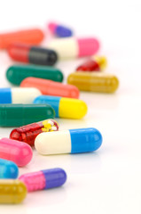 Obraz na płótnie Canvas Colorful of oral medications on White Background.