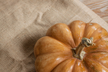 large pumpkin on sackcloth