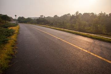 Naklejka premium Beautiful Sun Rising Sky With Asphalt Highways Road