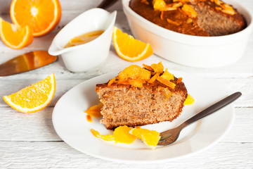 a piece of orange pie on the white plate