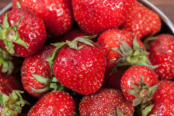 Fresh strawberries on wooden background