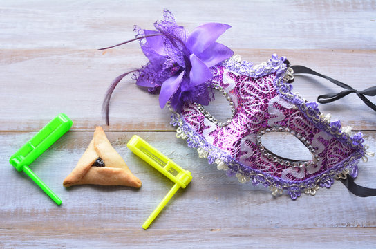Purim Mask with Hamantaschen cookieand graggers
