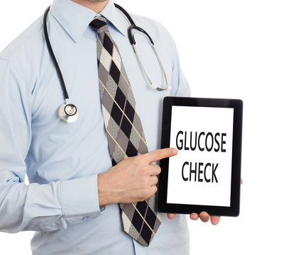 Doctor holding tablet - Glucose check