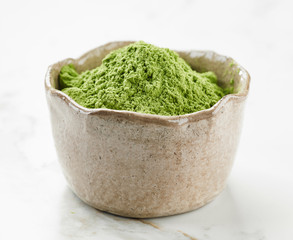 bowl of wheat grass powder