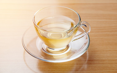 Hot lemon tea on table with soft light morning.