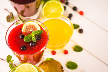 fresh berry smoothies, fruit shake with ingredients. healthy veggie food. no sugar, diet and detox concept.
