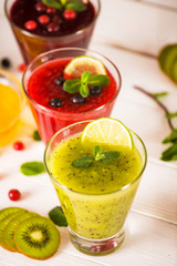 fresh berry smoothies, fruit shake with ingredients. healthy veggie food. no sugar, diet and detox concept.