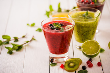 fresh berry smoothies, fruit shake. healthy eating, diet and detox concept.