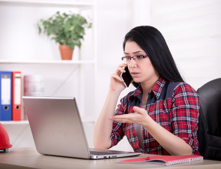 Woman engineer working in office