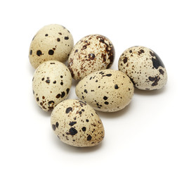 Quail eggs isolated on white background