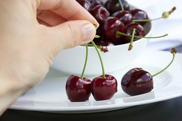Black sweet cherries. Closeup