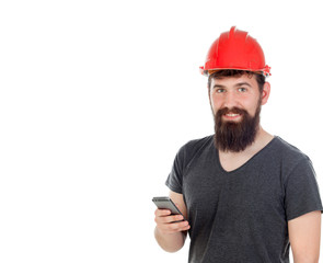 Young men with hipster look and red helmet looking the mobile