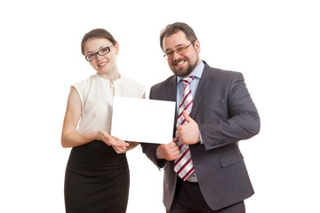 the woman and the man hold a sheet of paper