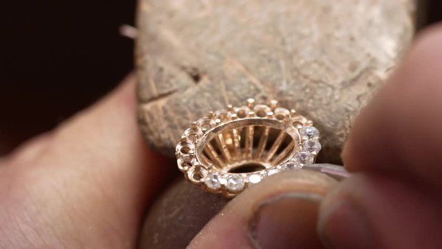 At the jeweller's workshop. Close up. Slow motion