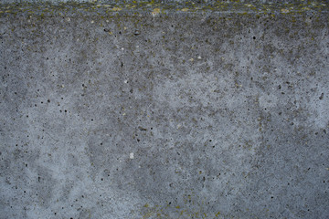 Old concrete with decal and moss